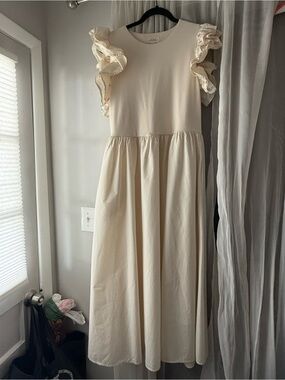 Elegant Cream Maxi Dress with Ruffle Sleeves
